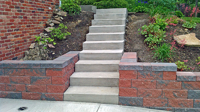 new concrete steps and retaining wall